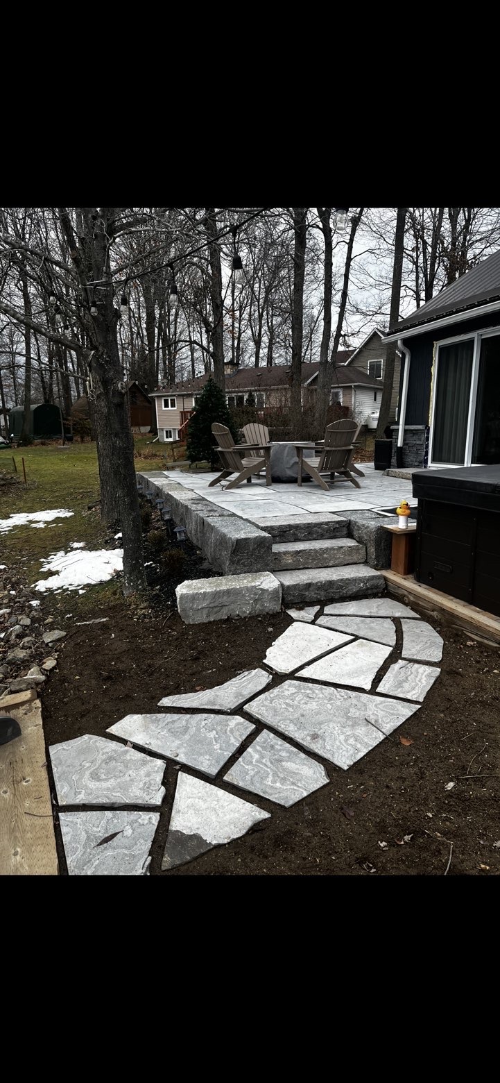 Flagstone patio with stone steps