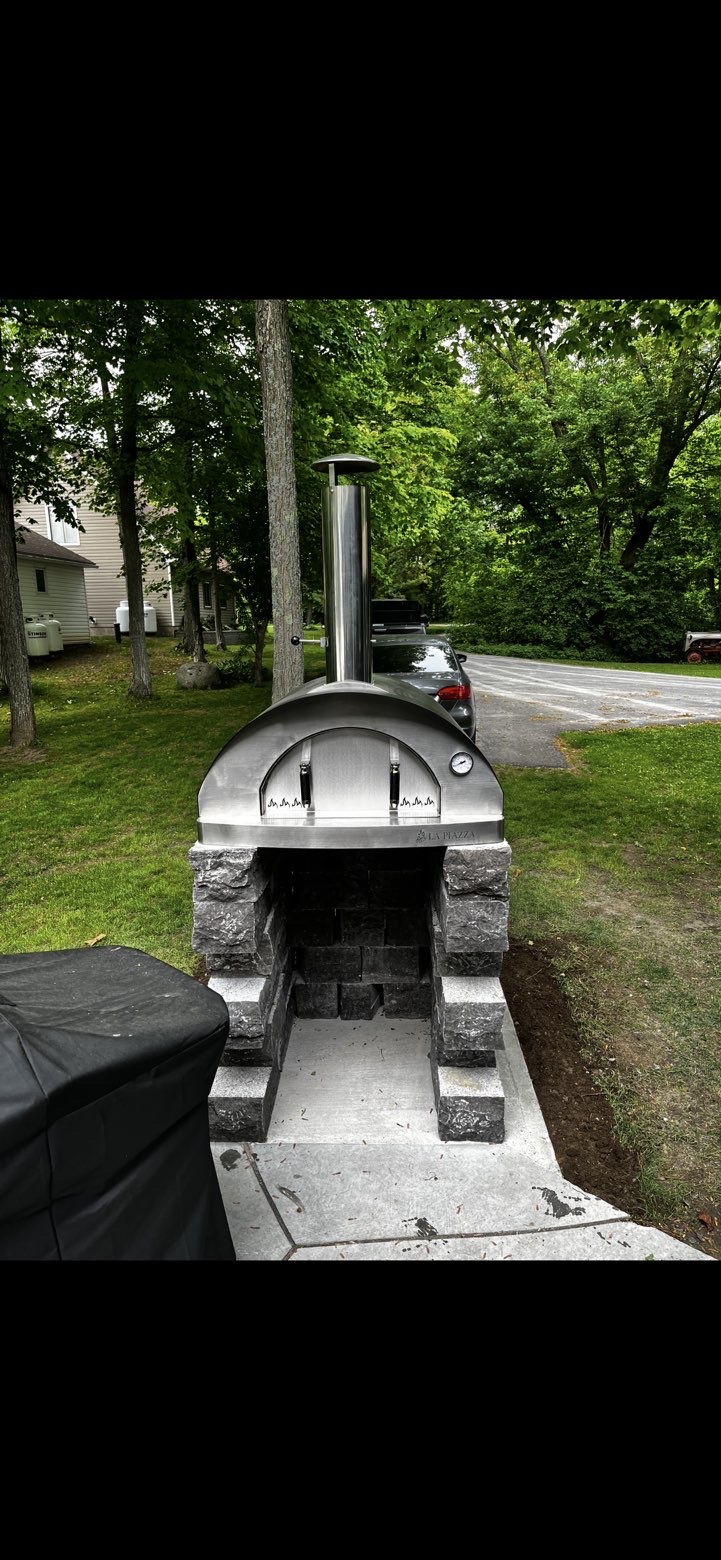 Stone-base wood-fired pizza oven